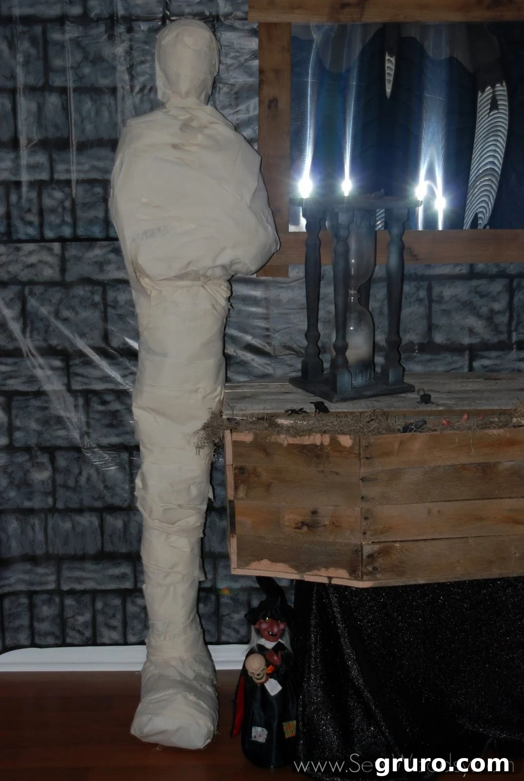 The finished DIY life-size mummy prop, standing impressively