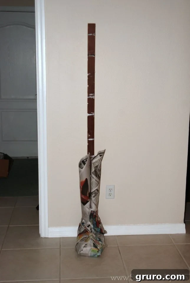 Securing the feet and legs to the central wooden support