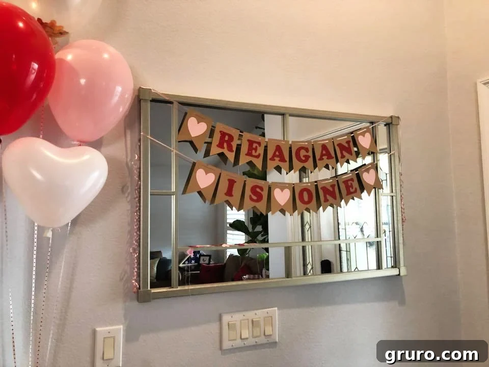 Handmade First Birthday Banner with Heart Accents