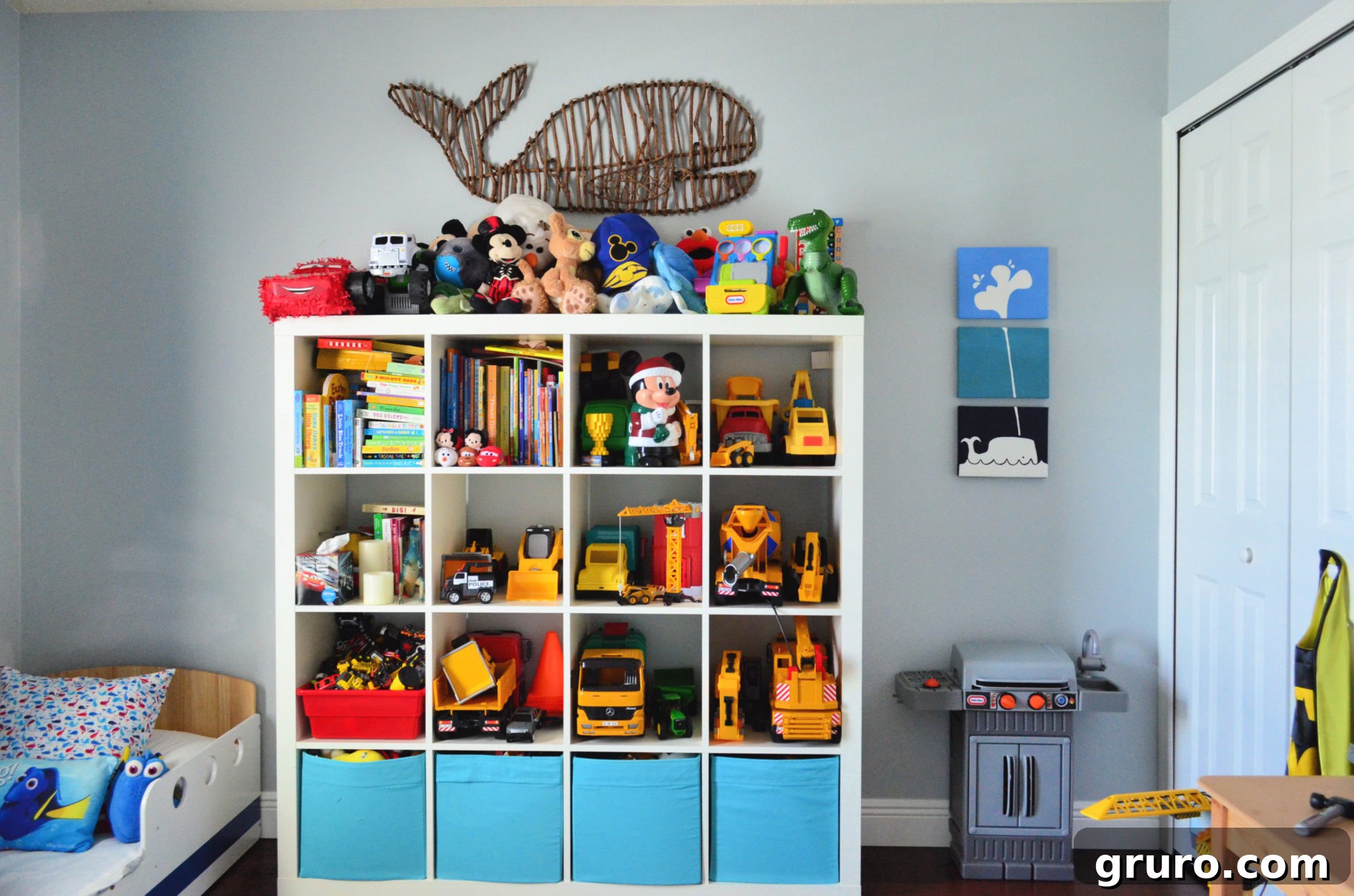 IKEA Kallax shelf unit with storage bins for toy organization