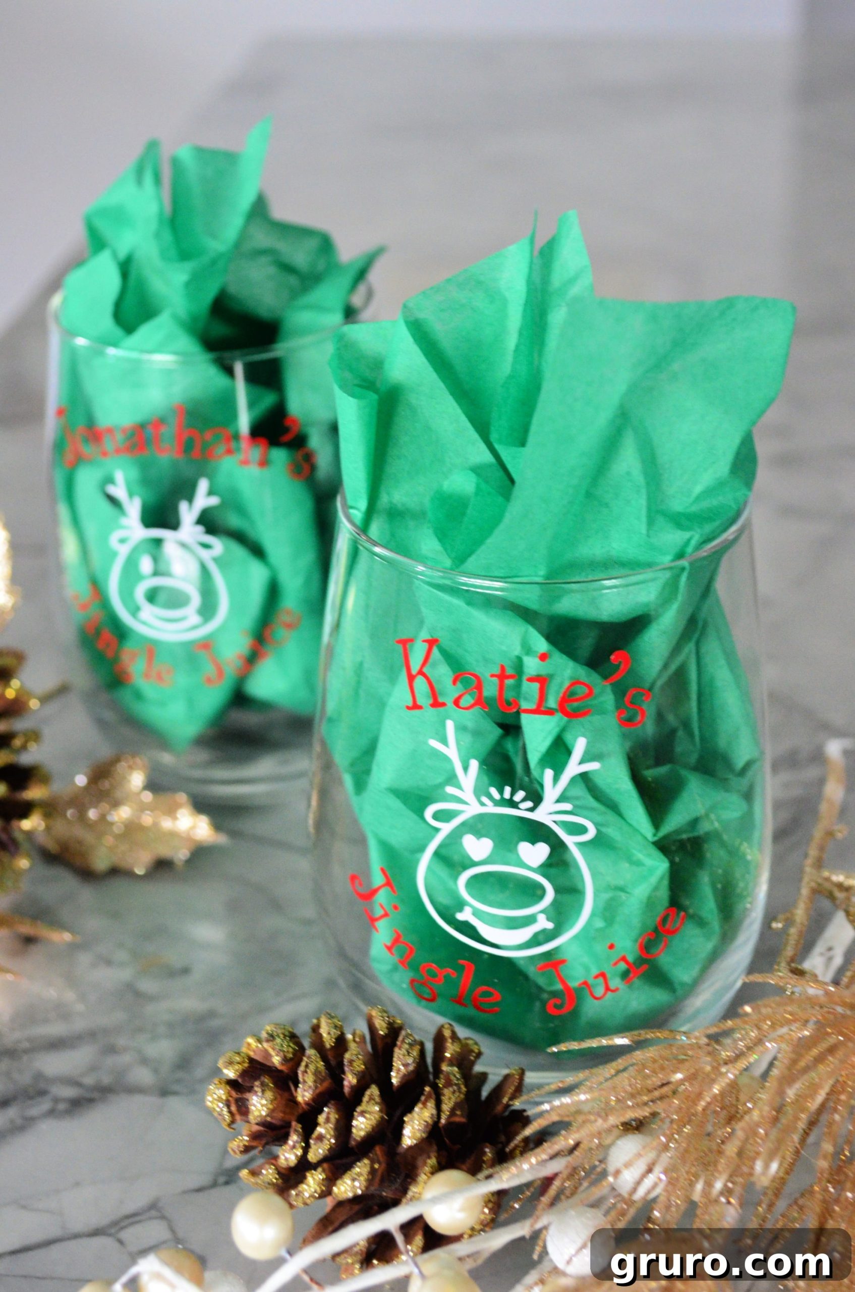Close-up of DIY Personalized Jingle Juice Christmas Wine Glasses