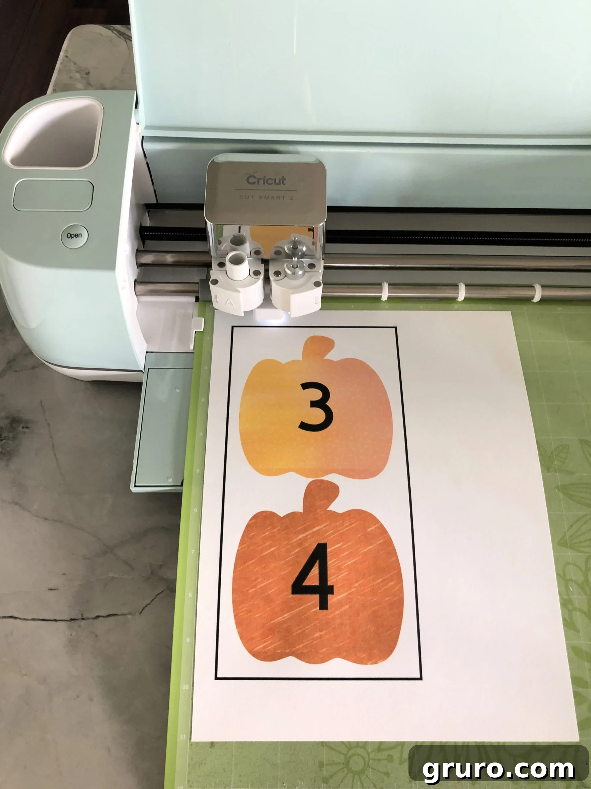 DIY Fishing for Numbered Pumpkins Game using the Cricut Explore Air 2 to cut the printed pumpkins