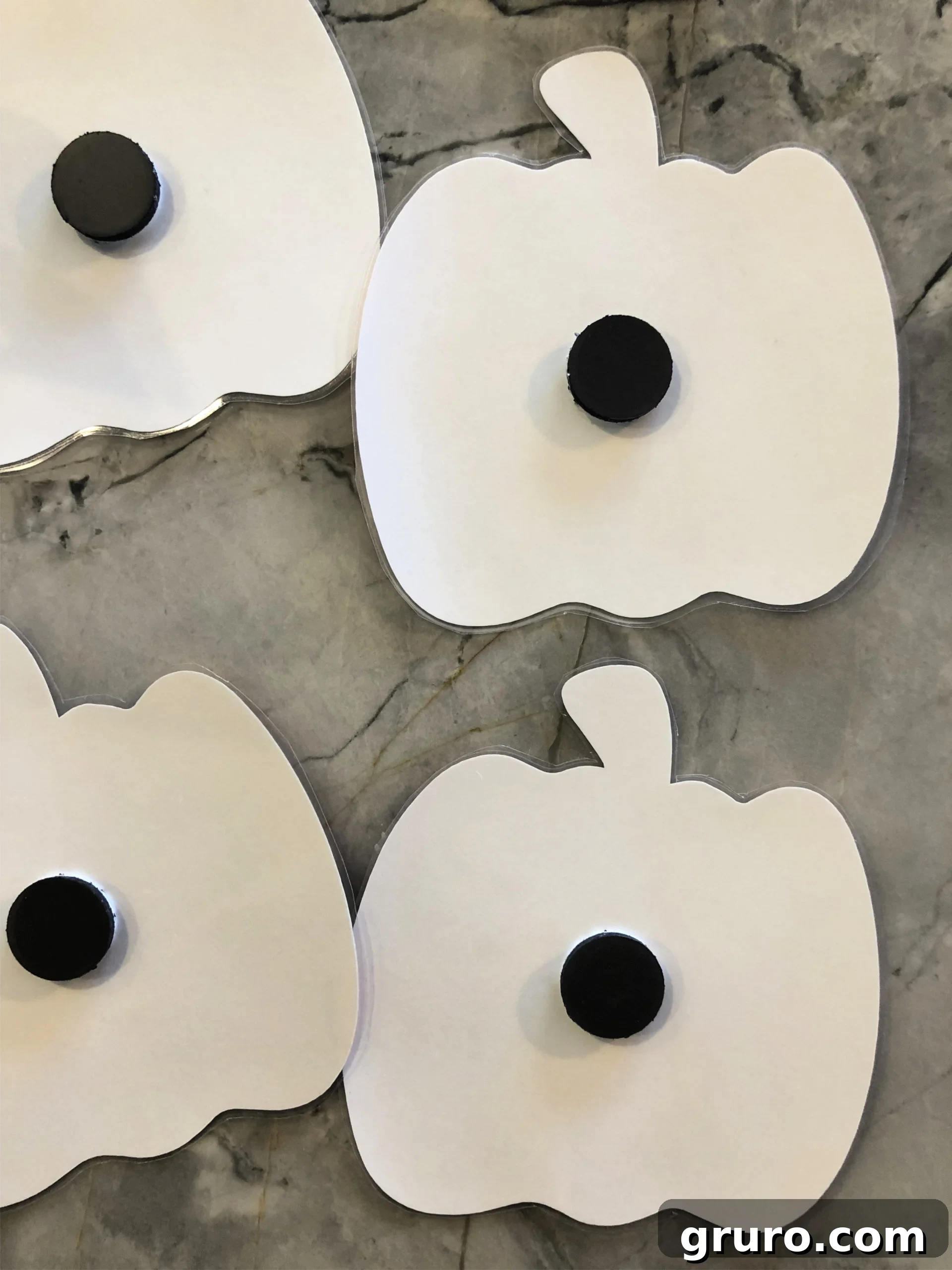 DIY Fishing for Numbered Pumpkins Game with magnets attached to the back