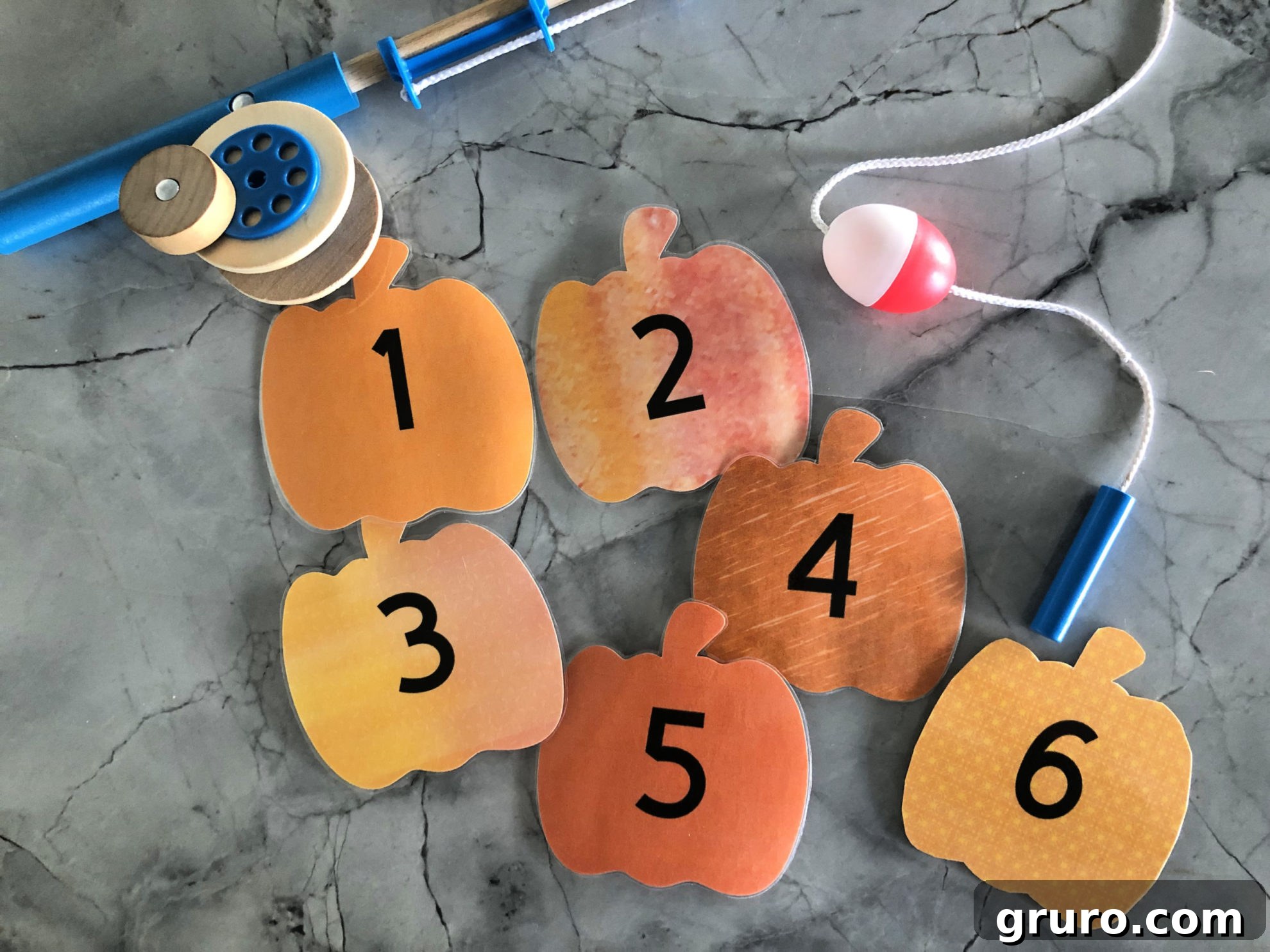 DIY Fishing for Numbered Pumpkins Game ready for class parties.