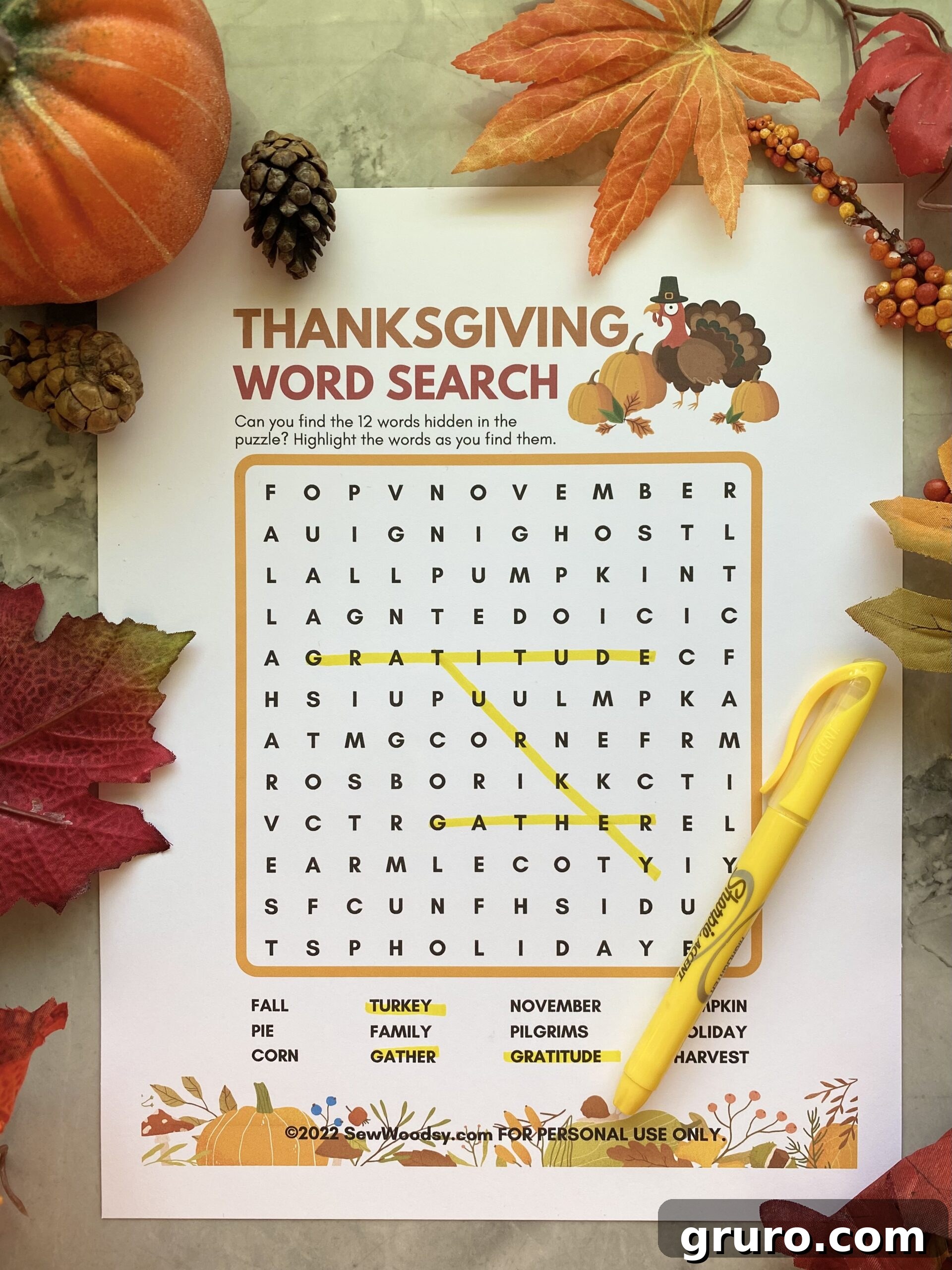 Thanksgiving Word Search for Kids featuring fall leaves and pumpkins
