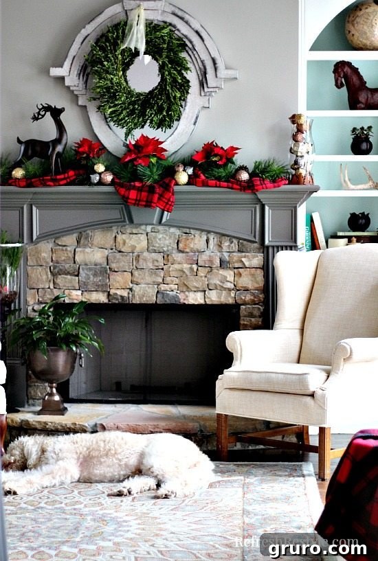 Christmas Mantel with real poinsettias and plaid at refreshrestyle.com
