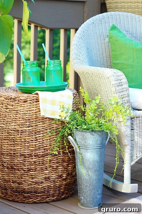 The refreshed deck showcases a beautiful variety of wicker furniture, harmoniously unified with spray paint.