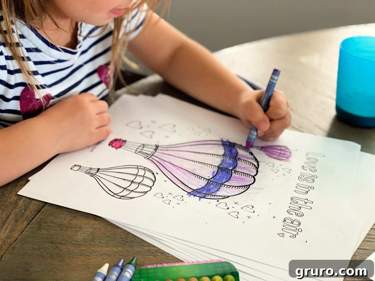 Sweetheart Valentine's Coloring Fun 8 Close up of a little girl coloring hot air balloons with a purple crayon, showcasing joyful engagement in the activity.