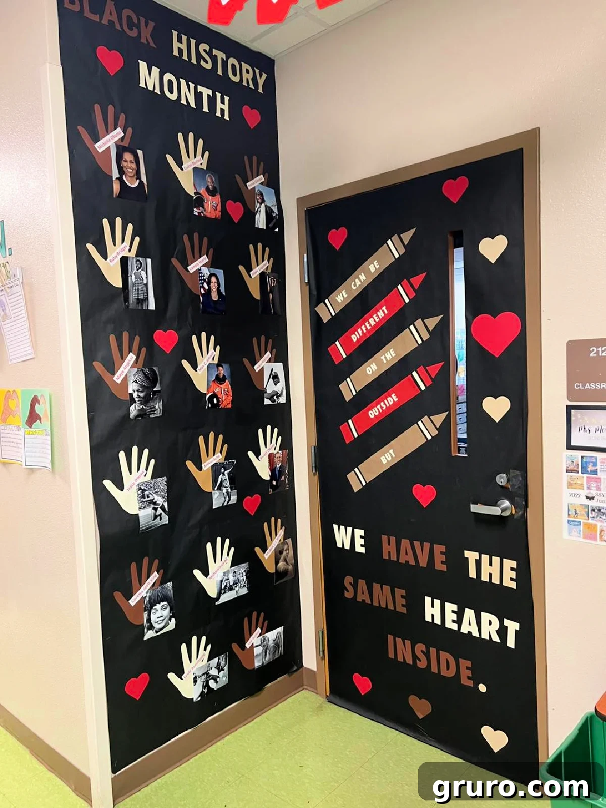 Black door and wall with words on door, crayons, and cream and red hearts.