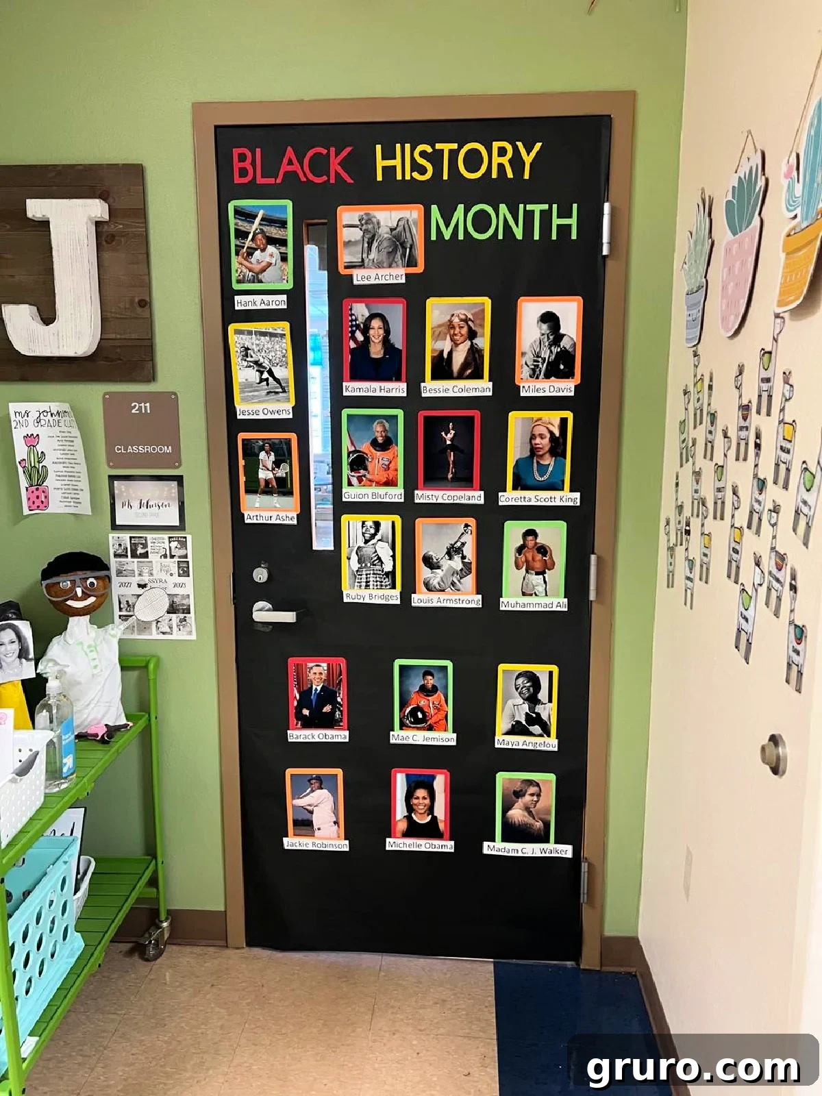 Black door with the words "black history month" and photos of influential African Americans.
