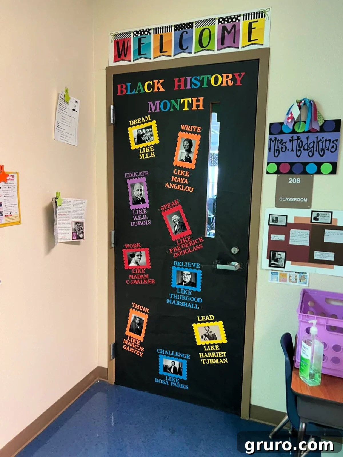 Black door with different black history people on colored paper on the door.