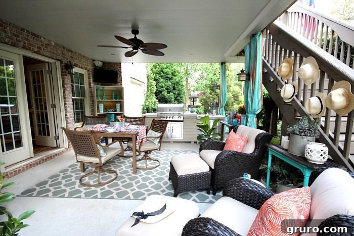 Patio setup for dining, grilling, and chilling, featuring no-sew outdoor curtains and affordable decor