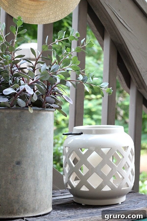 Better Homes and Gardens ceramic candle lantern enhancing an affordable outdoor entertaining space