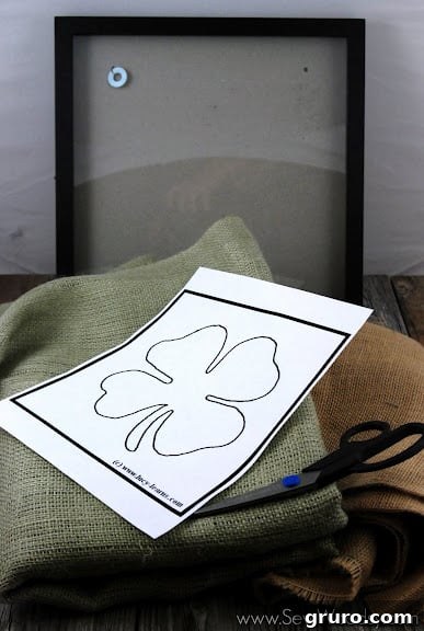 Materials laid out for making burlap four leaf clover wall art