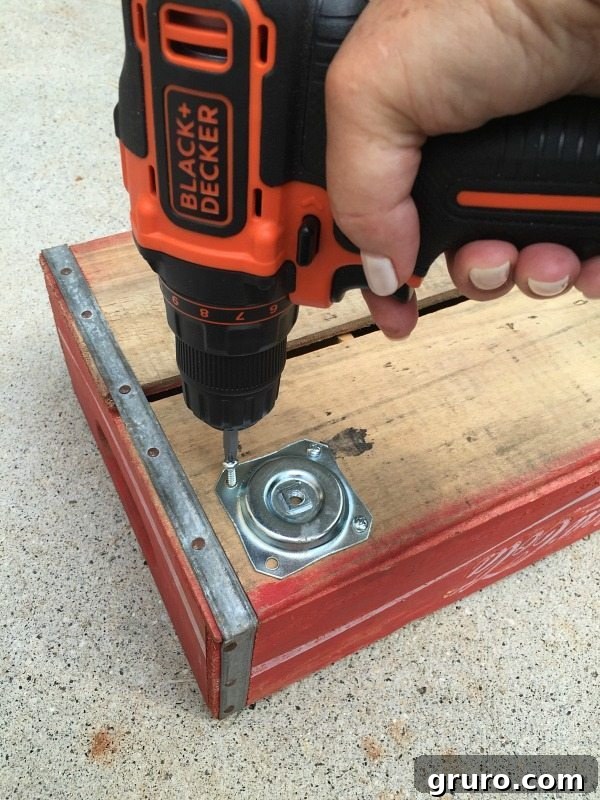 How to attach legs - make a vintage Coke Crate Table at refreshrestyle.com