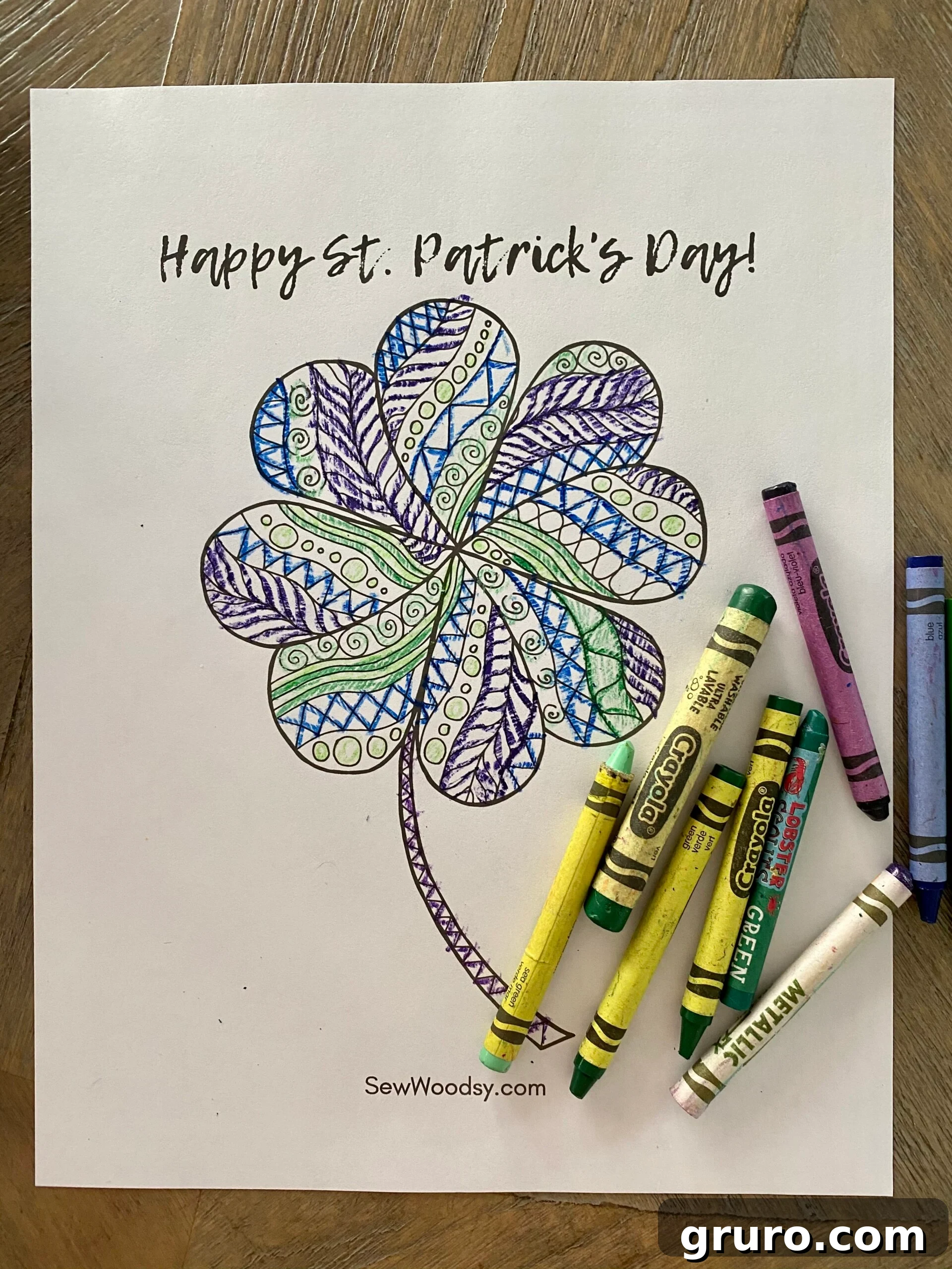 Coloring page with crayons on page that says 