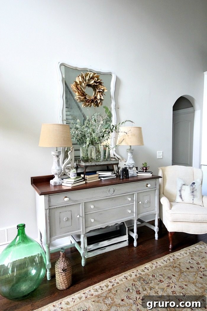 Light and Bright entry with painted furniture - lamps - mirror