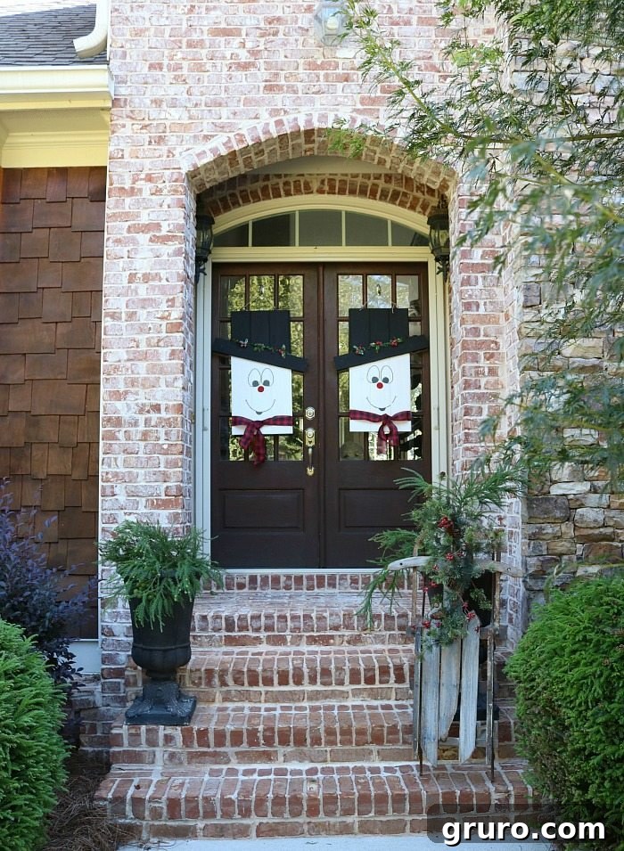 Adorable snowman door hanger, reversible to a fall scarecrow, ideal for winter decor. Easy DIY craft from Home Depot.