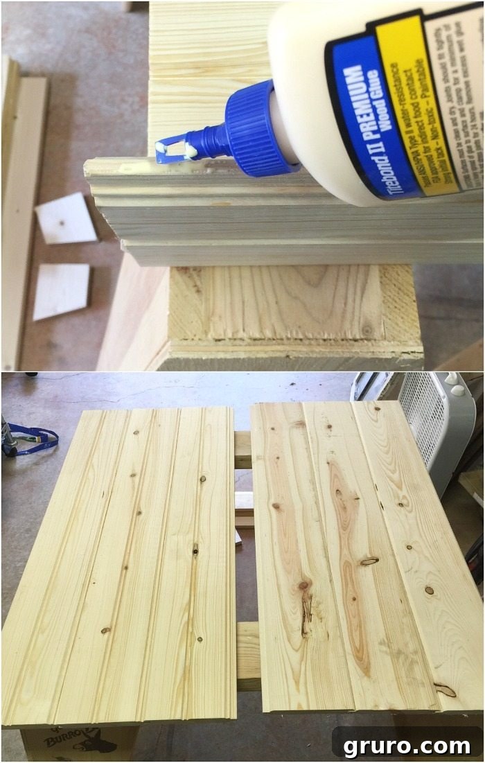 Applying wood glue to the tongue and groove boards to assemble the base of the seasonal door hanger.