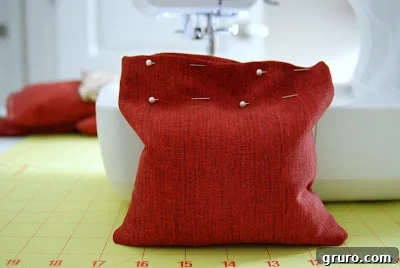 The open end of a bean bag, folded inward and pinned, ready for final sewing