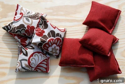 A set of newly sewn bean bags in two different colors, ready for play