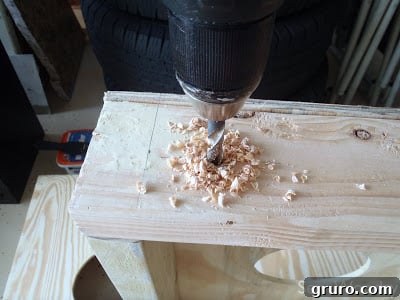 Wooden legs for a cornhole board, cut to size with one end rounded for pivoting
