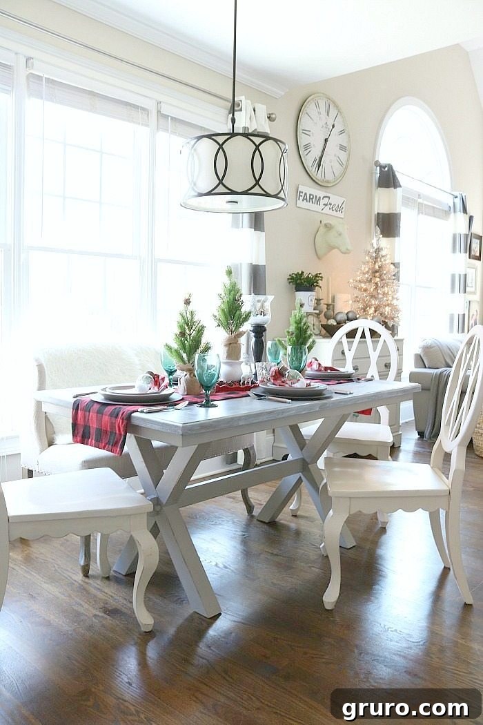 Buffalo Check Farmhouse Christmas Table Warm and inviting farmhouse table adorned with buffalo check for Christmas festivities