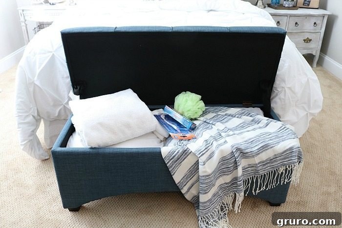 Put a bench at the foot of the bed, perfect for storing all the extras for guest and great place to sit