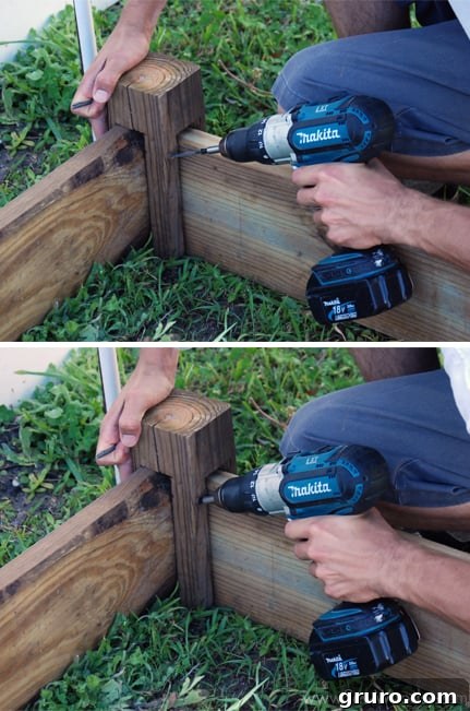 Mr. Woodsy drilling into the corner of a raised garden bed frame to secure the joint with screws or fasteners.