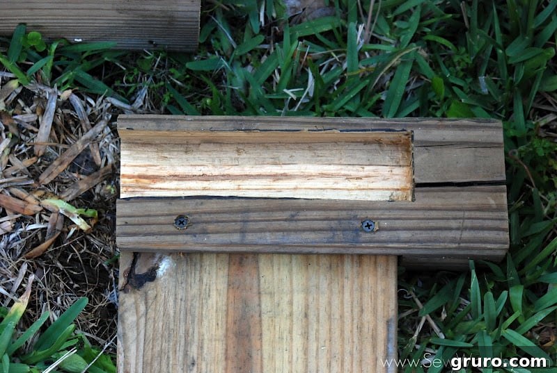 A securely fastened corner joint of a raised garden bed, demonstrating the stability after drilling and assembly.
