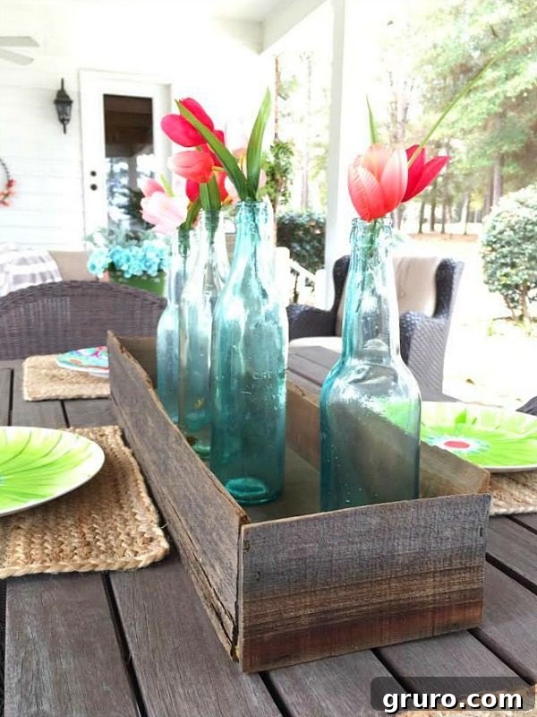 Barn wood box with old bottles for a farmhouse centerpiece