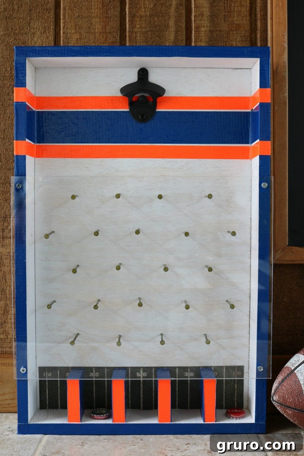 Auburn colors for this DIY bottle opener game at Refresh Restyle, vibrant and spirited