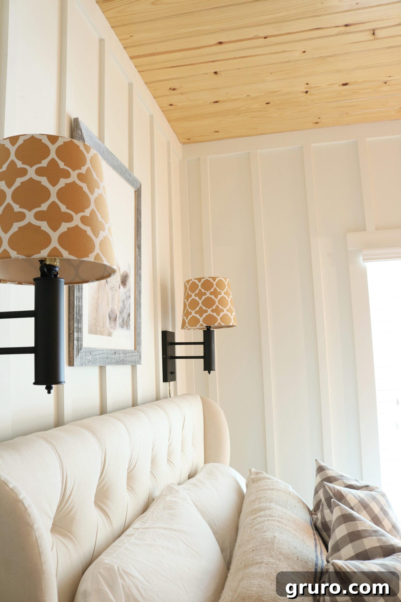 Give Your Brass a Modern Makeover 9 Light and bright farmhouse bedroom with flat black lights above the bed