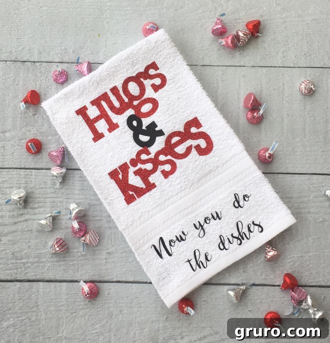 Valentine's Day towel idea: A handmade 'Hugs & Kisses' towel made with heat transfer vinyl