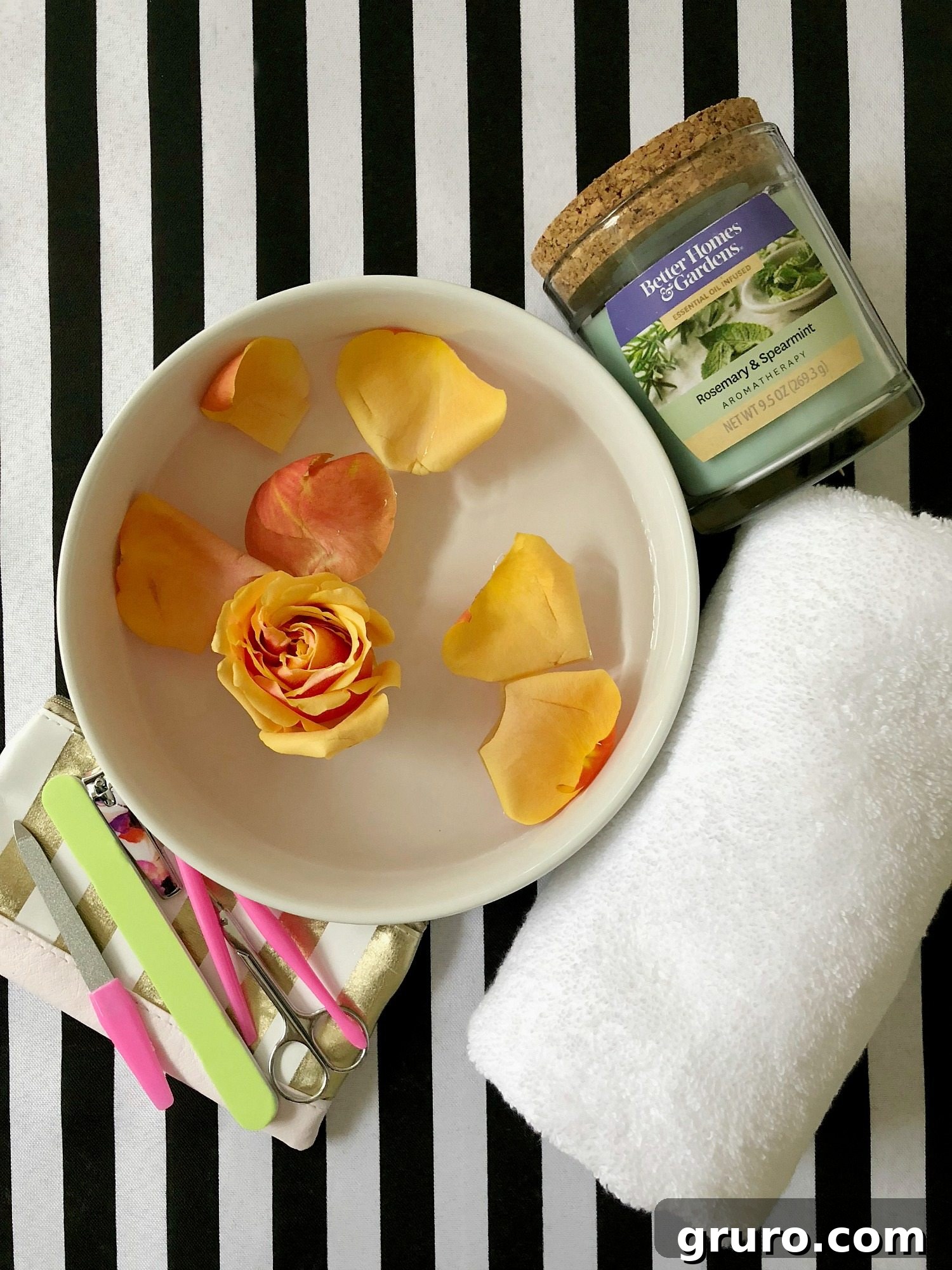 Close-up of a beautifully arranged spa basket with nail polishes, lotions, and a scented candle, ready for pampering.