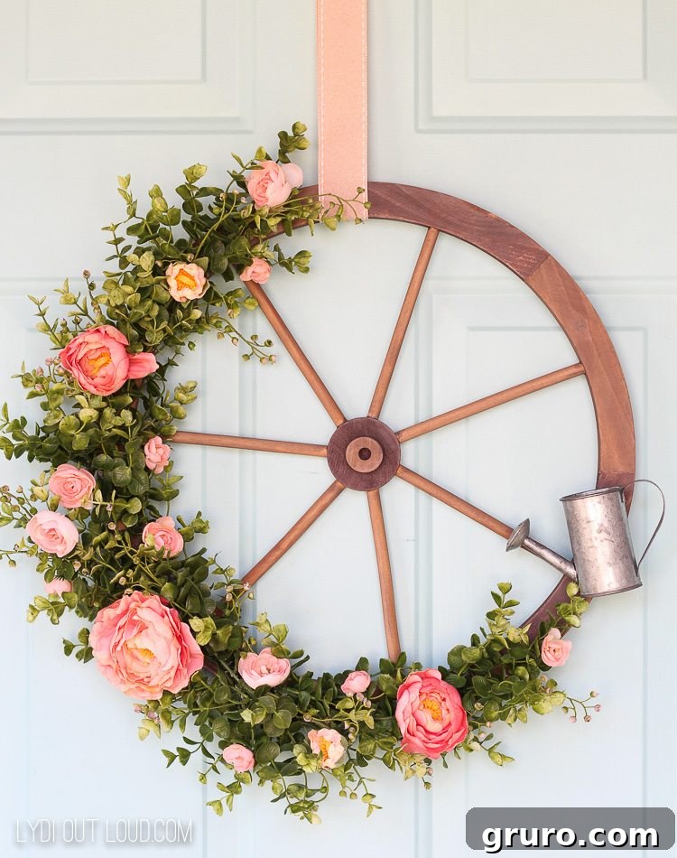 Craft a beautiful farmhouse wagon wheel wreath for a rustic spring touch. farmhouse wagon wheel wreath