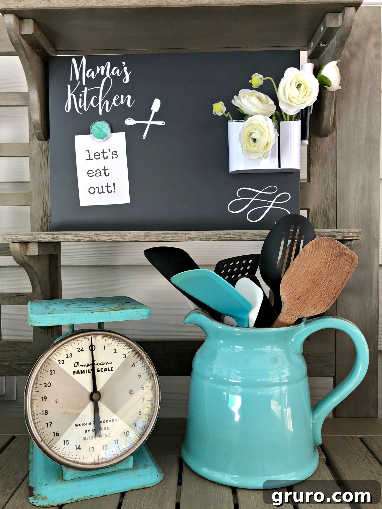 Full view of the 'Mama's Kitchen' chalkboard displayed in a kitchen setting, emphasizing its role as a charming and personalized decor piece.