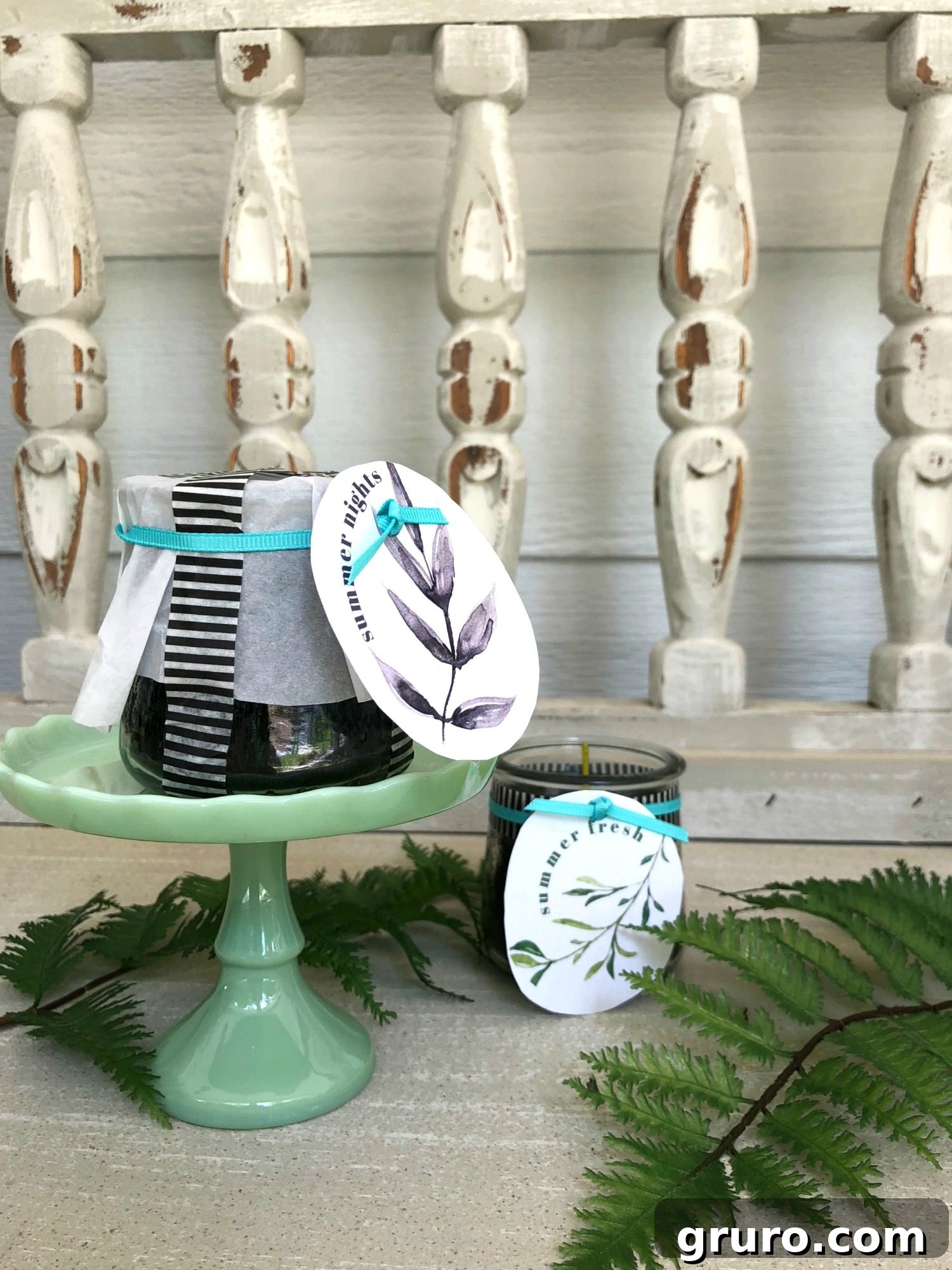 Repurposed Oui yogurt jars transformed into charming candles, adorned with a free printable label