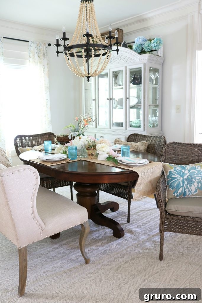 Indoor/outdoor cable knit rug in a mixed-style dining room