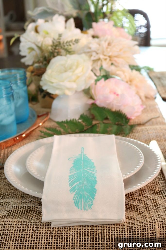 DIY inked feather napkins on a casual farmhouse dining table