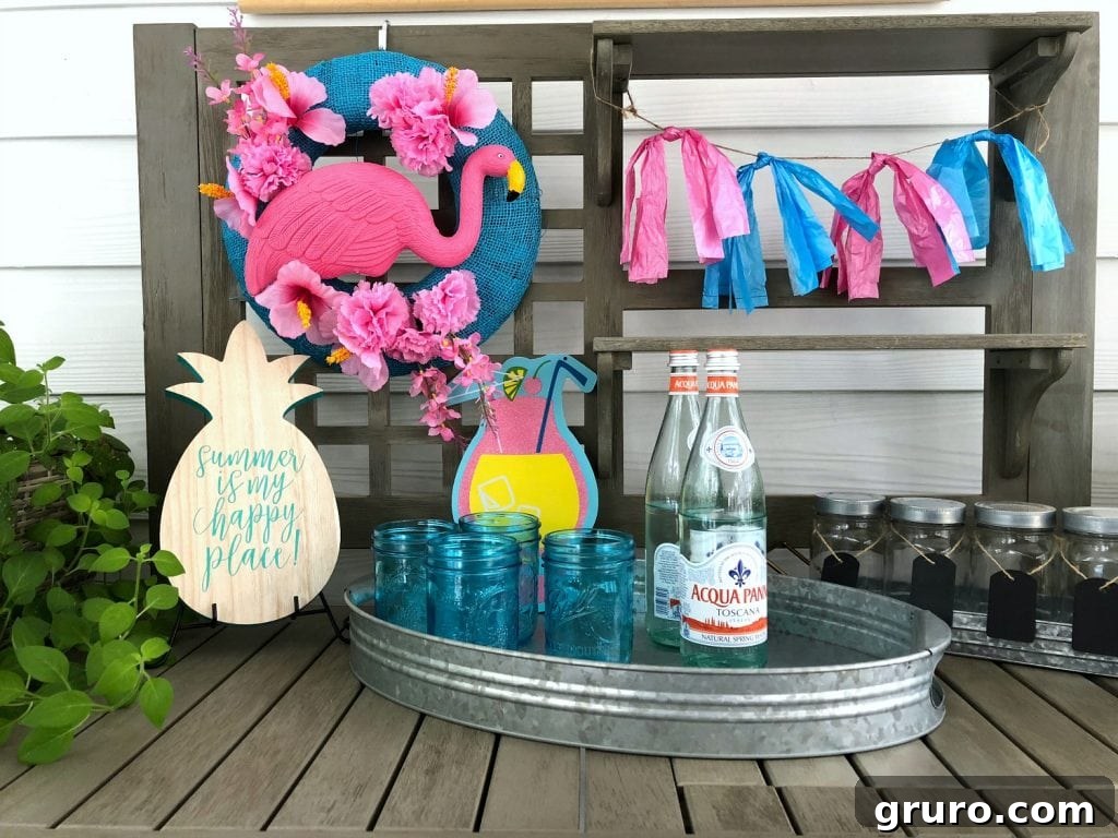 Flamingo wreath displayed as festive party decor on an outdoor potting bench