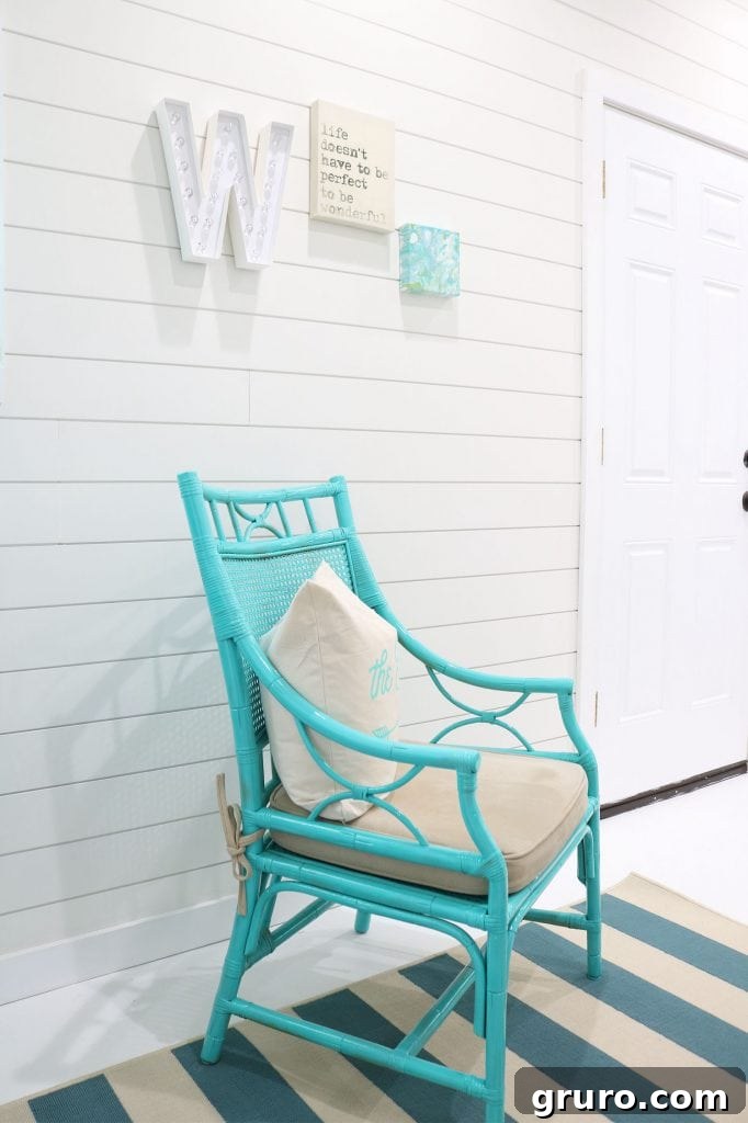 Light and bright small office with shiplap walls and colorful accessories
