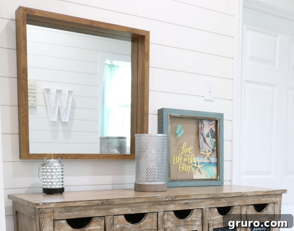 Decorate your office with a stylish mirror and lamps for a cozy feel