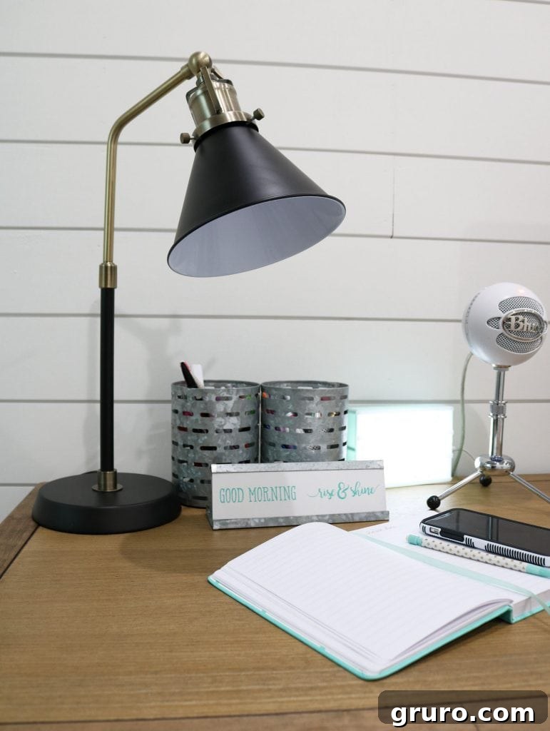 Desk lamp providing task lighting for an organized home office