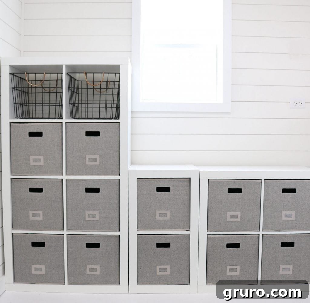 Stylish wire baskets and fabric bins providing ample storage in a small home office