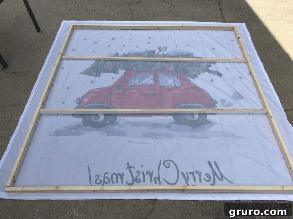 Easy Christmas art, large 5' Position frame over shower curtain for 5-foot wall decor, demonstrating placement before stapling.