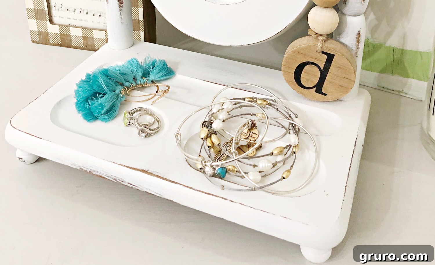 Before and after comparison of a table top mirror makeover