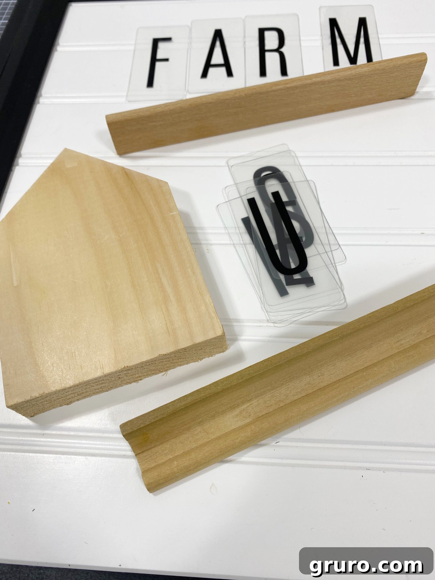 supplies for picture frame makeover including glue gun