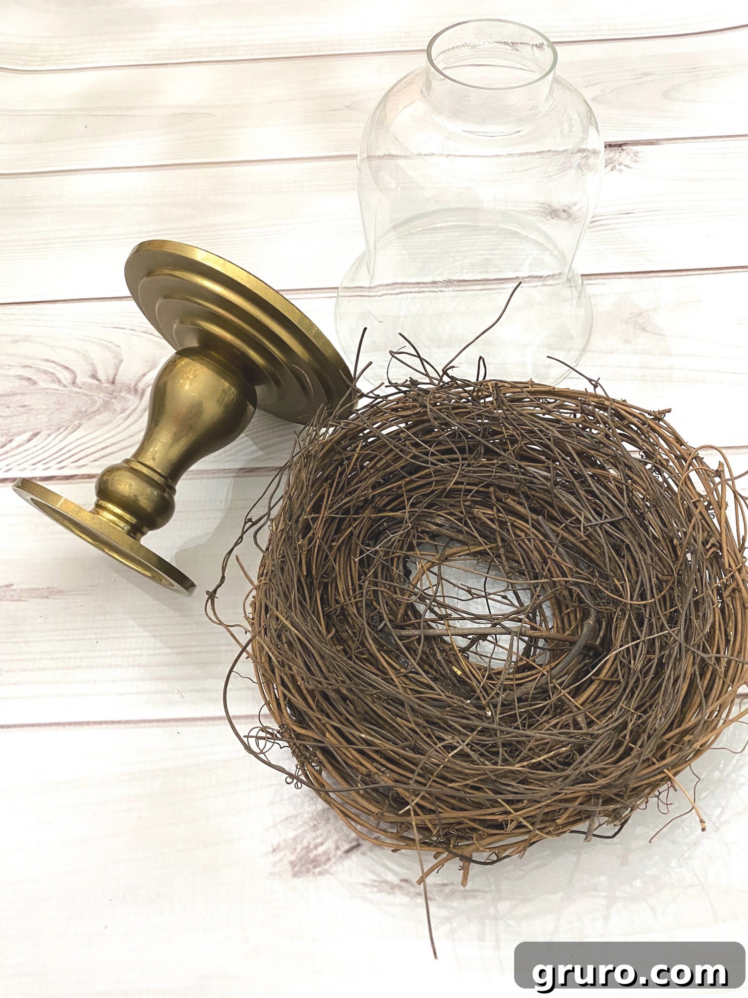 Finished DIY Spring Cloche with a bird nest inside