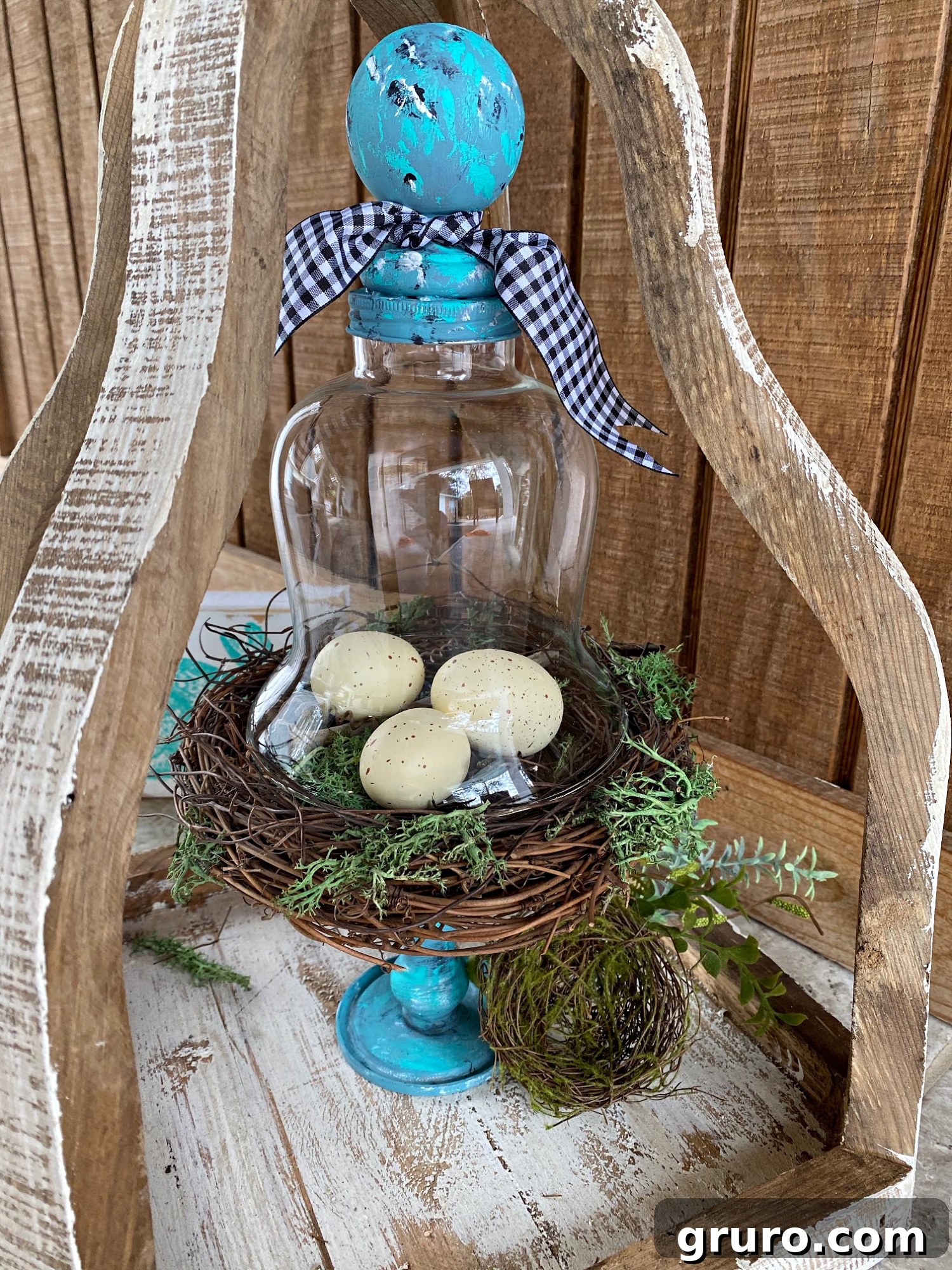 Close-up of the completed Cloche with a miniature bird nest and eggs